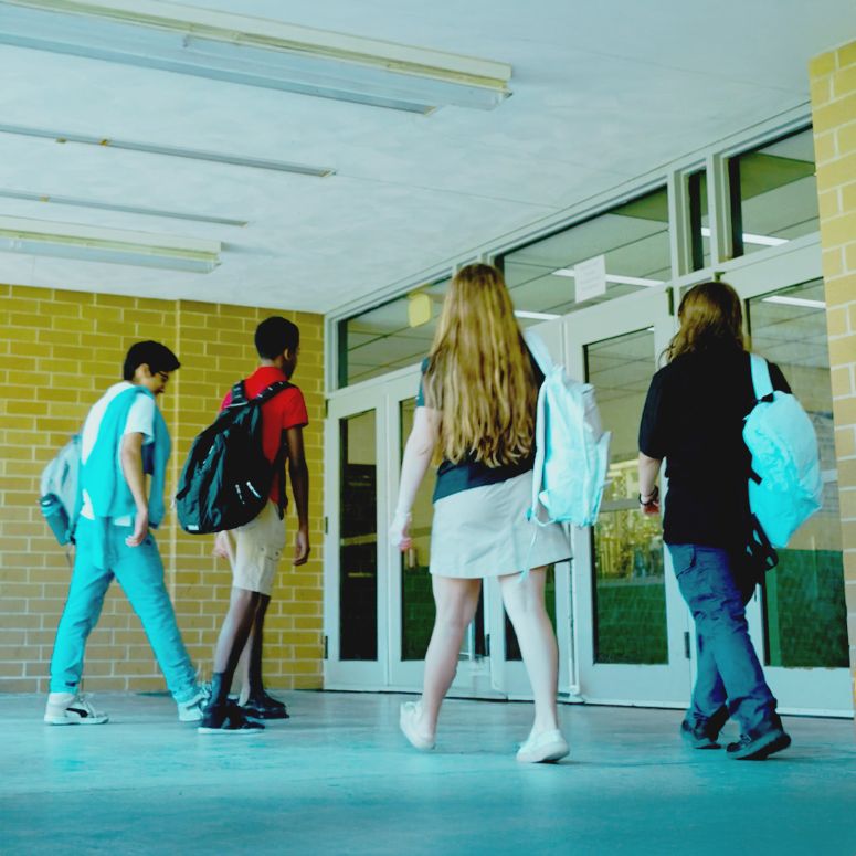 Kids walking into school